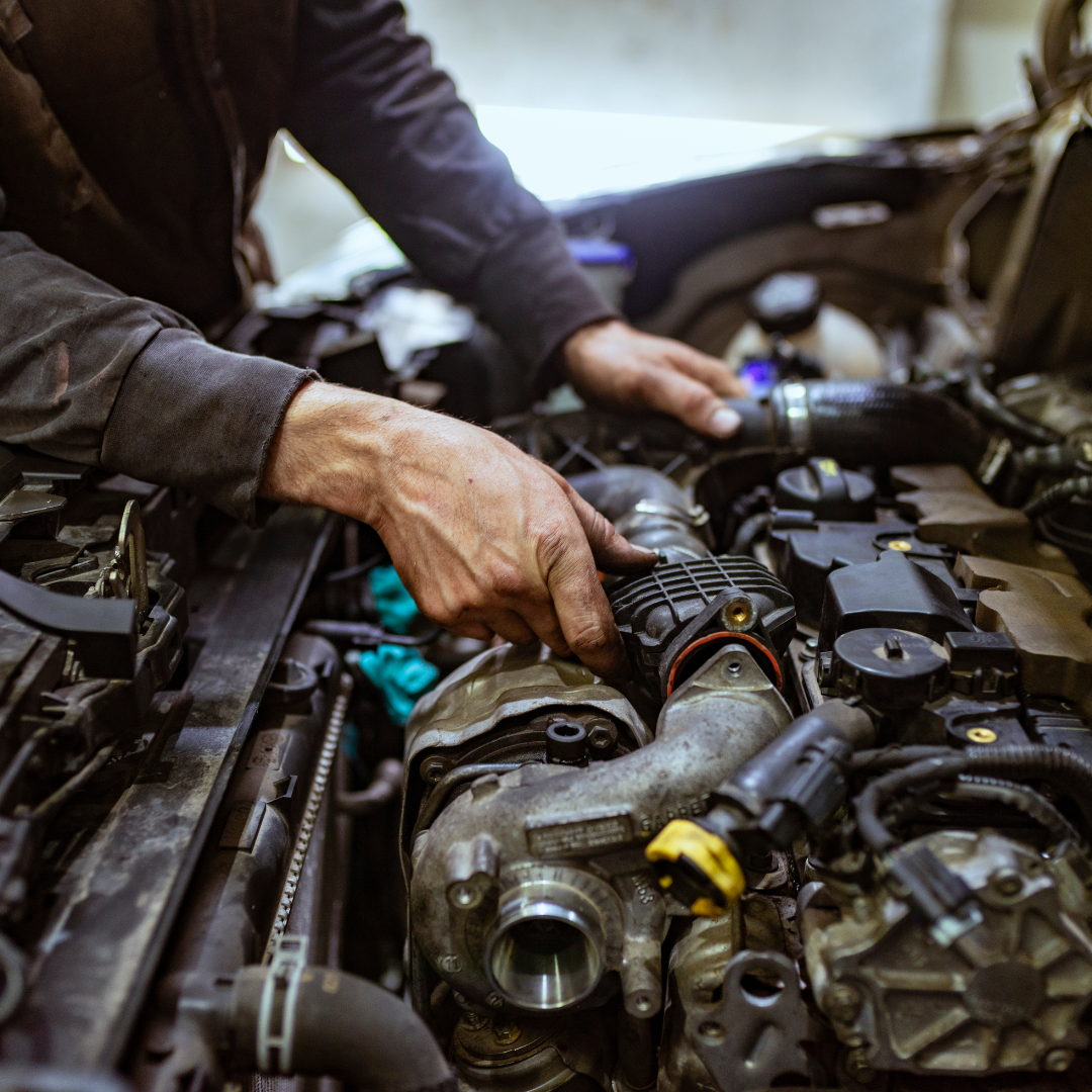 diesel mechanic repairing turbo in Victoria